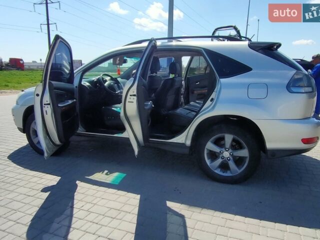 Серый Лексус РХ, объемом двигателя 3 л и пробегом 254 тыс. км за 9700 $, фото 1 на Automoto.ua