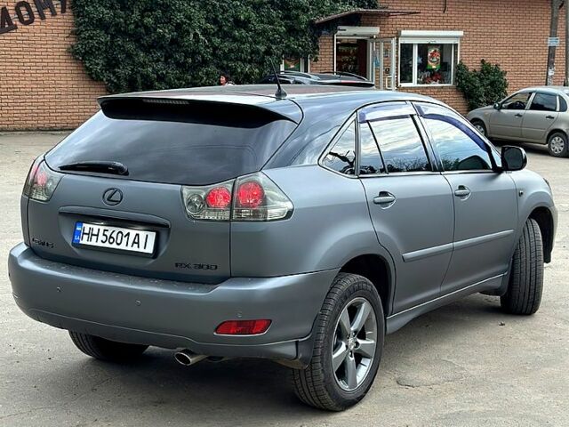 Серый Лексус РХ, объемом двигателя 3 л и пробегом 260 тыс. км за 11000 $, фото 2 на Automoto.ua