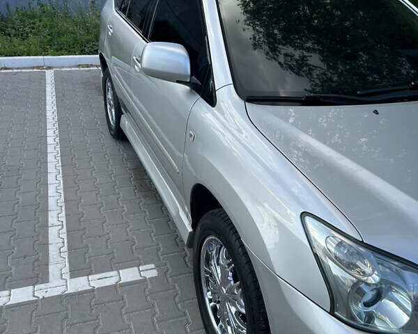 Серый Лексус РХ, объемом двигателя 3 л и пробегом 229 тыс. км за 11700 $, фото 3 на Automoto.ua