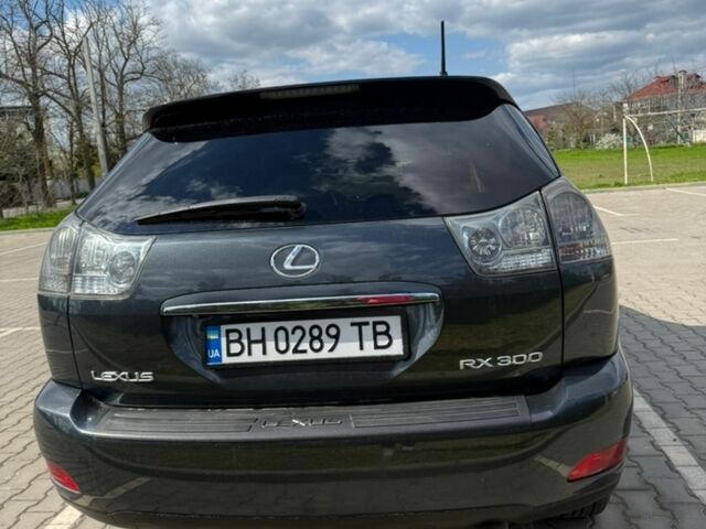 Сірий Лексус РХ, об'ємом двигуна 3 л та пробігом 227 тис. км за 12000 $, фото 4 на Automoto.ua