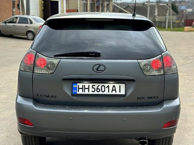Серый Лексус РХ, объемом двигателя 3 л и пробегом 260 тыс. км за 11000 $, фото 5 на Automoto.ua