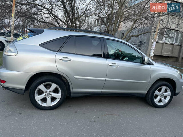 Серый Лексус РХ, объемом двигателя 3.3 л и пробегом 182 тыс. км за 11794 $, фото 2 на Automoto.ua