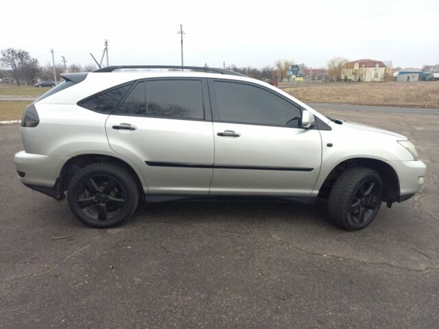 Серый Лексус РХ, объемом двигателя 3.3 л и пробегом 239 тыс. км за 10500 $, фото 1 на Automoto.ua