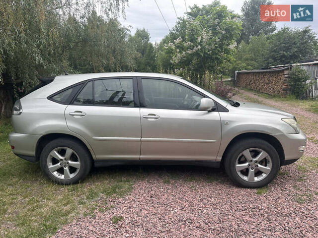 Серый Лексус РХ, объемом двигателя 3.31 л и пробегом 221 тыс. км за 9500 $, фото 2 на Automoto.ua