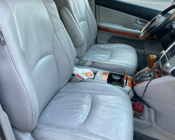 Серый Лексус РХ, объемом двигателя 3.3 л и пробегом 182 тыс. км за 11794 $, фото 4 на Automoto.ua