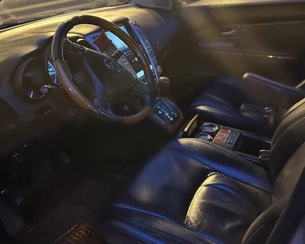 Серый Лексус РХ, объемом двигателя 3.46 л и пробегом 270 тыс. км за 13999 $, фото 10 на Automoto.ua