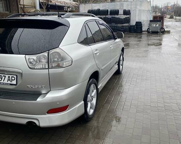 Серый Лексус РХ, объемом двигателя 3.5 л и пробегом 304 тыс. км за 9500 $, фото 3 на Automoto.ua