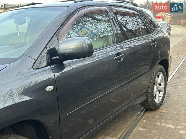 Сірий Лексус РХ, об'ємом двигуна 3.3 л та пробігом 258 тис. км за 9299 $, фото 12 на Automoto.ua