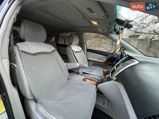 Сірий Лексус РХ, об'ємом двигуна 3.3 л та пробігом 258 тис. км за 9299 $, фото 26 на Automoto.ua