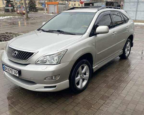 Серый Лексус РХ, объемом двигателя 3.5 л и пробегом 304 тыс. км за 9500 $, фото 1 на Automoto.ua