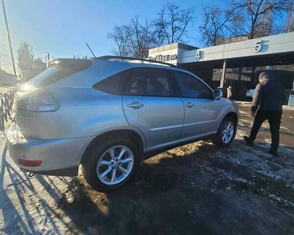 Серый Лексус РХ, объемом двигателя 3.5 л и пробегом 255 тыс. км за 10500 $, фото 1 на Automoto.ua