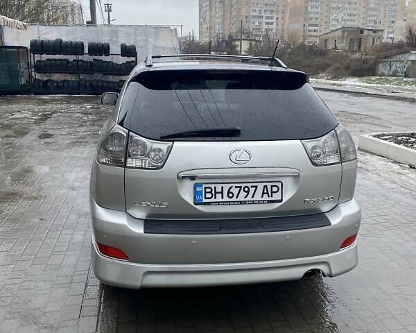 Серый Лексус РХ, объемом двигателя 3.5 л и пробегом 304 тыс. км за 9500 $, фото 2 на Automoto.ua