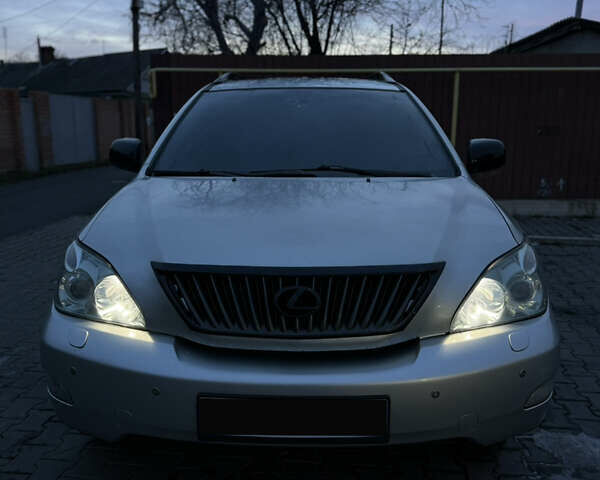 Сірий Лексус РХ, об'ємом двигуна 3.46 л та пробігом 380 тис. км за 11000 $, фото 1 на Automoto.ua