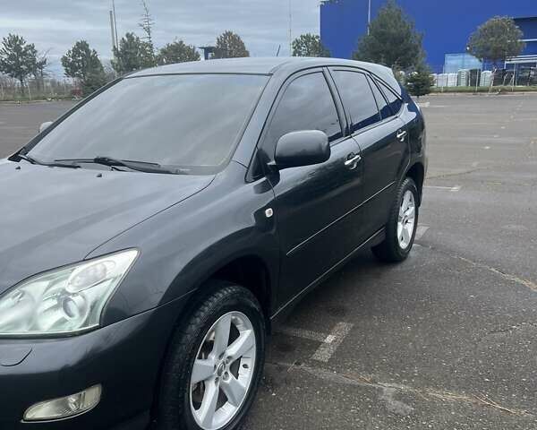 Сірий Лексус РХ, об'ємом двигуна 3.46 л та пробігом 228 тис. км за 11300 $, фото 1 на Automoto.ua