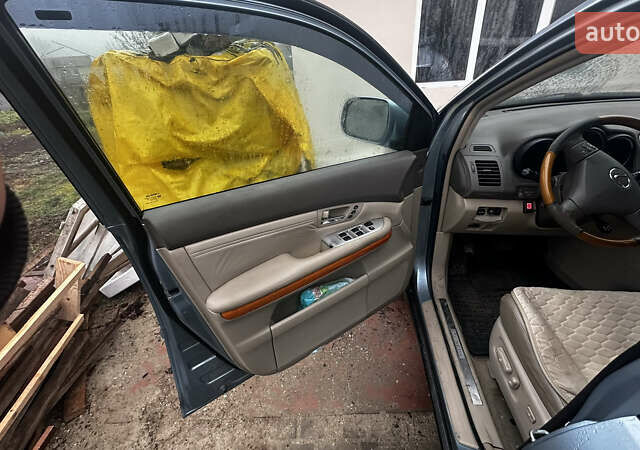 Серый Лексус РХ, объемом двигателя 3.46 л и пробегом 274 тыс. км за 10900 $, фото 4 на Automoto.ua