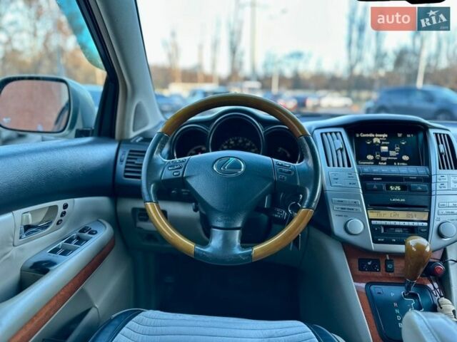 Серый Лексус РХ, объемом двигателя 3.3 л и пробегом 306 тыс. км за 13500 $, фото 18 на Automoto.ua