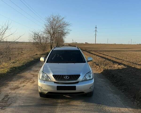 Серый Лексус РХ, объемом двигателя 3.46 л и пробегом 370 тыс. км за 9500 $, фото 3 на Automoto.ua