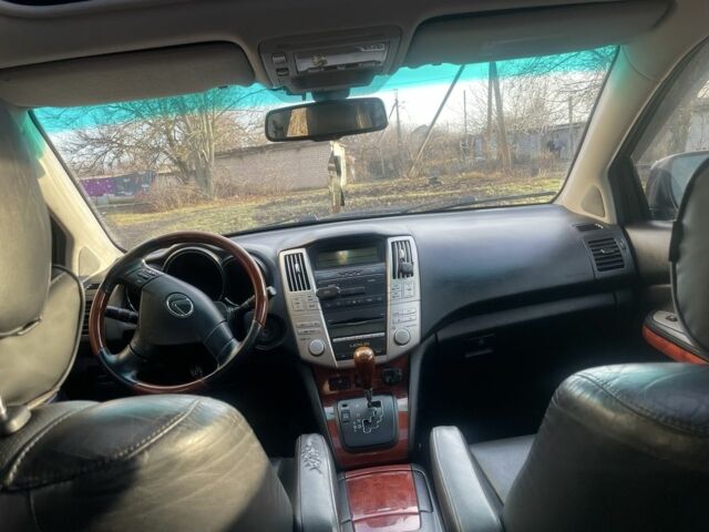 Серый Лексус РХ, объемом двигателя 3.5 л и пробегом 300 тыс. км за 8700 $, фото 4 на Automoto.ua