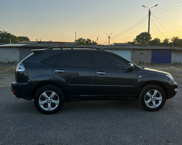 Серый Лексус РХ, объемом двигателя 3.5 л и пробегом 173 тыс. км за 14999 $, фото 3 на Automoto.ua