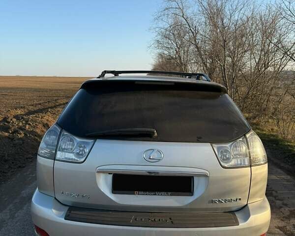 Серый Лексус РХ, объемом двигателя 3.46 л и пробегом 370 тыс. км за 9500 $, фото 4 на Automoto.ua