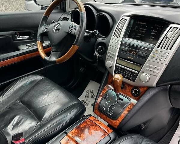 Серый Лексус РХ, объемом двигателя 3.5 л и пробегом 297 тыс. км за 11200 $, фото 2 на Automoto.ua