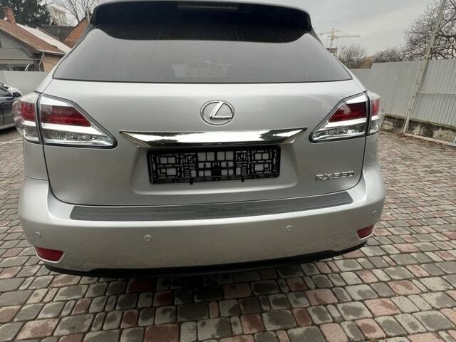Серый Лексус РХ, объемом двигателя 3.5 л и пробегом 129 тыс. км за 18900 $, фото 2 на Automoto.ua