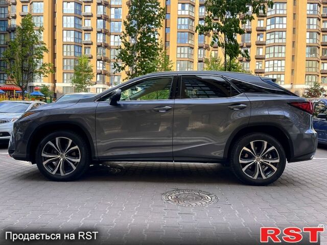 Серый Лексус РХ, объемом двигателя 3.5 л и пробегом 100 тыс. км за 28999 $, фото 2 на Automoto.ua