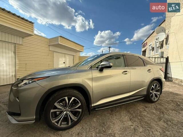 Серый Лексус РХ, объемом двигателя 2 л и пробегом 134 тыс. км за 42900 $, фото 1 на Automoto.ua
