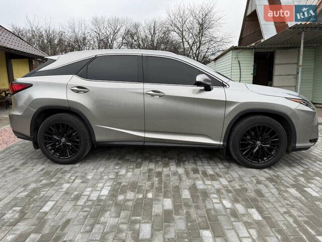 Серый Лексус РХ, объемом двигателя 2 л и пробегом 76 тыс. км за 38900 $, фото 3 на Automoto.ua