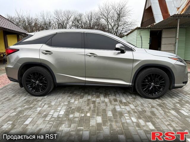 Сірий Лексус РХ, об'ємом двигуна 2 л та пробігом 77 тис. км за 38900 $, фото 1 на Automoto.ua