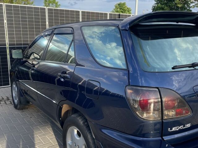 Синій Лексус РХ, об'ємом двигуна 3 л та пробігом 303 тис. км за 5100 $, фото 2 на Automoto.ua