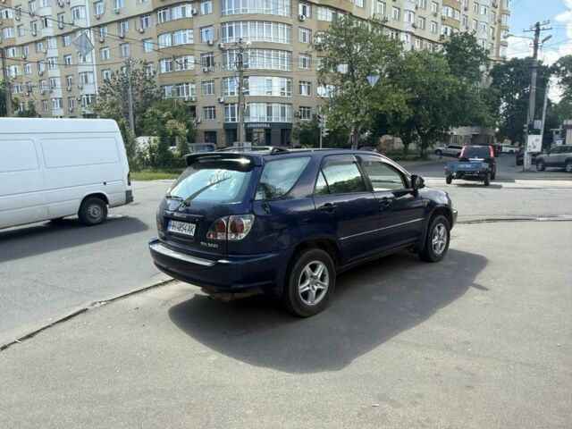 Синий Лексус РХ, объемом двигателя 3 л и пробегом 295 тыс. км за 5500 $, фото 1 на Automoto.ua