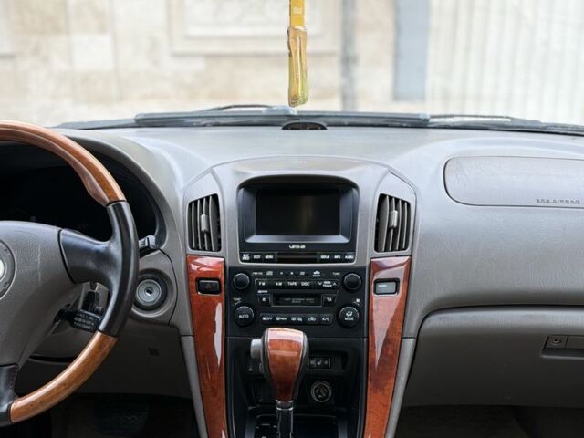 Синий Лексус РХ, объемом двигателя 3 л и пробегом 220 тыс. км за 6700 $, фото 23 на Automoto.ua