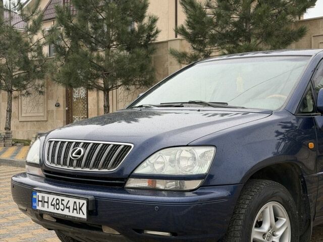 Синий Лексус РХ, объемом двигателя 3 л и пробегом 220 тыс. км за 6700 $, фото 2 на Automoto.ua