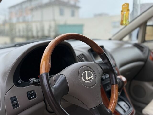 Синий Лексус РХ, объемом двигателя 3 л и пробегом 220 тыс. км за 6700 $, фото 12 на Automoto.ua