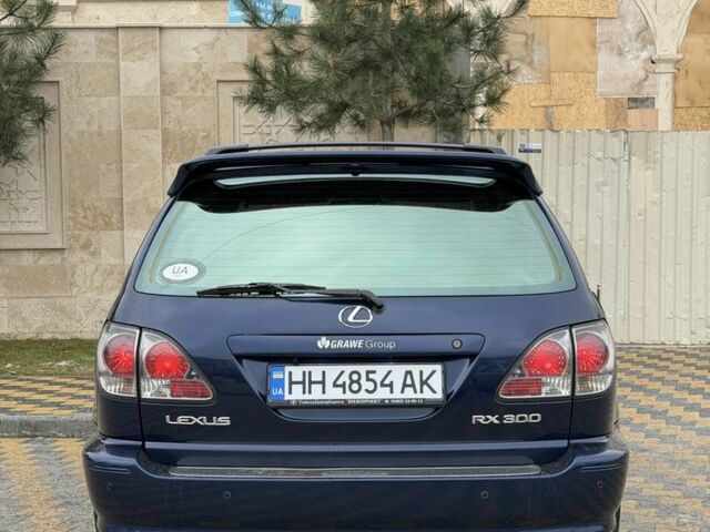 Синий Лексус РХ, объемом двигателя 3 л и пробегом 220 тыс. км за 6700 $, фото 6 на Automoto.ua