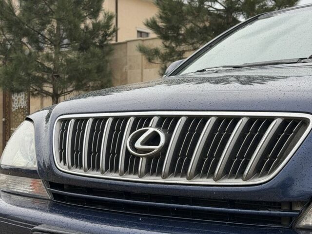 Синий Лексус РХ, объемом двигателя 3 л и пробегом 220 тыс. км за 6700 $, фото 4 на Automoto.ua