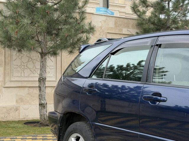 Синий Лексус РХ, объемом двигателя 3 л и пробегом 220 тыс. км за 6700 $, фото 5 на Automoto.ua