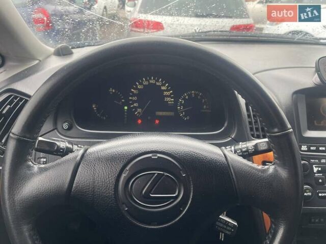 Синій Лексус РХ, об'ємом двигуна 3 л та пробігом 310 тис. км за 4999 $, фото 7 на Automoto.ua