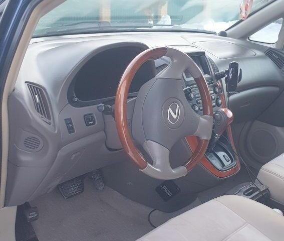 Синий Лексус РХ, объемом двигателя 3 л и пробегом 274 тыс. км за 6500 $, фото 2 на Automoto.ua