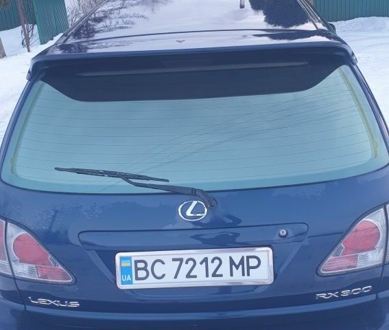 Синий Лексус РХ, объемом двигателя 3 л и пробегом 274 тыс. км за 6500 $, фото 4 на Automoto.ua