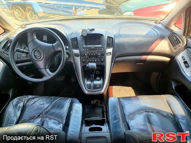 Синий Лексус РХ, объемом двигателя 3 л и пробегом 280 тыс. км за 3800 $, фото 4 на Automoto.ua