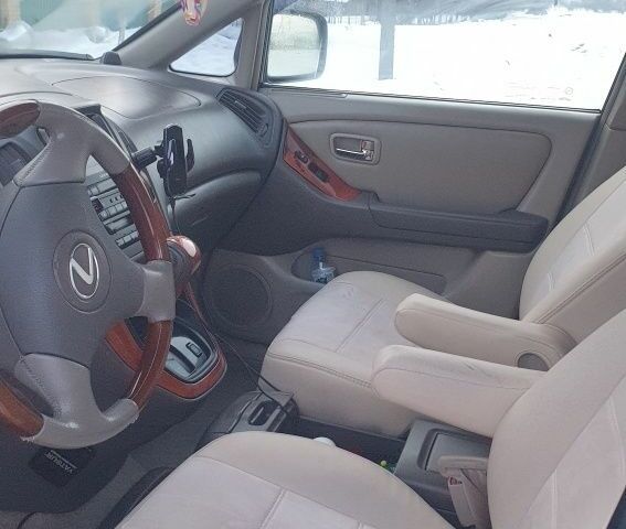 Синий Лексус РХ, объемом двигателя 3 л и пробегом 274 тыс. км за 6500 $, фото 1 на Automoto.ua