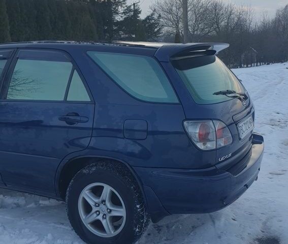 Синий Лексус РХ, объемом двигателя 3 л и пробегом 274 тыс. км за 6500 $, фото 8 на Automoto.ua