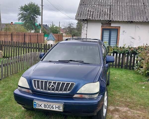 Синій Лексус РХ, об'ємом двигуна 3 л та пробігом 320 тис. км за 4600 $, фото 1 на Automoto.ua