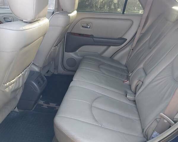 Синій Лексус РХ, об'ємом двигуна 3 л та пробігом 320 тис. км за 4600 $, фото 2 на Automoto.ua