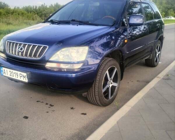 Синий Лексус РХ, объемом двигателя 3 л и пробегом 194 тыс. км за 6145 $, фото 2 на Automoto.ua