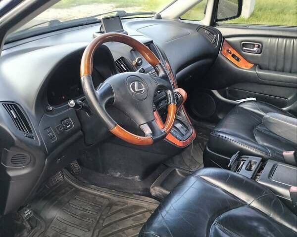 Синий Лексус РХ, объемом двигателя 3 л и пробегом 194 тыс. км за 6145 $, фото 6 на Automoto.ua