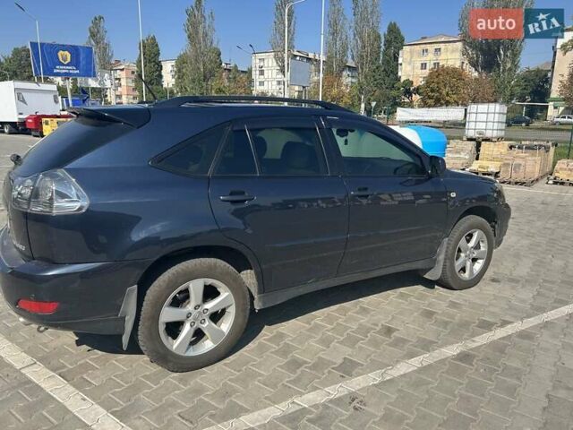 Синий Лексус РХ, объемом двигателя 3.3 л и пробегом 154 тыс. км за 11500 $, фото 4 на Automoto.ua