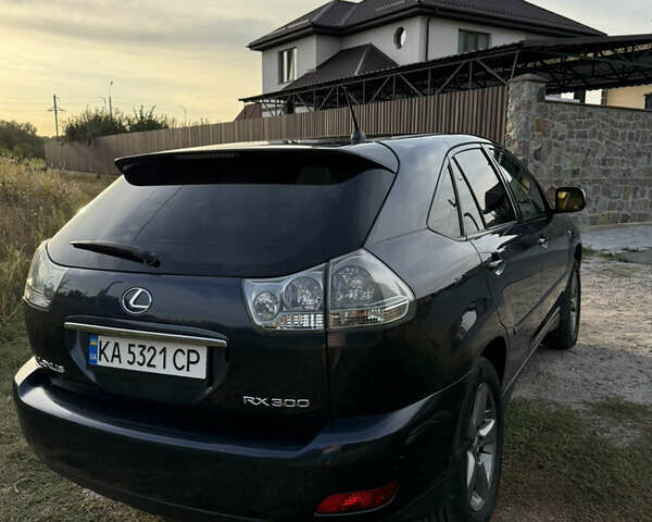 Синий Лексус РХ, объемом двигателя 3 л и пробегом 337 тыс. км за 8300 $, фото 3 на Automoto.ua